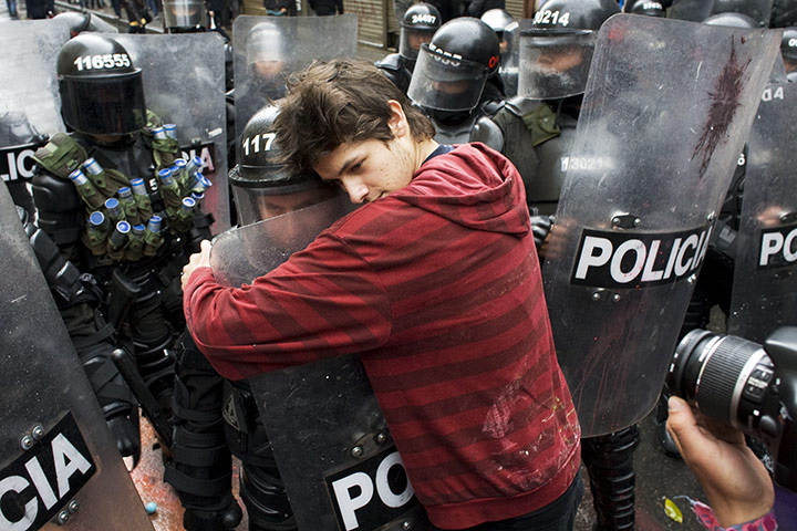 protester-hugging-cop.jpg